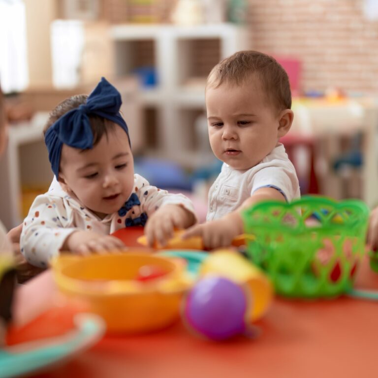 group-toddlers-learning-eat-sitting-table-kindergarten